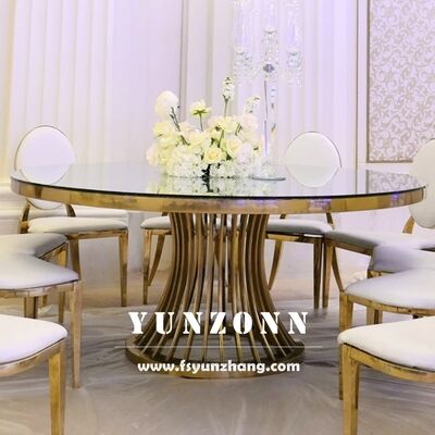 Καλή τιμή Λούξυ στρογγυλό τραπέζι με βάση από χρυσαφένιο ανοξείδωτο χάλυβα και γυάλινη κορυφή για γάμους και δεξιώσεις σε απευθείας σύνδεση